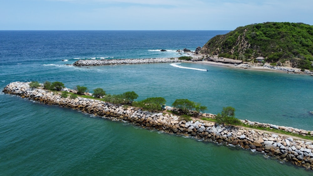 an aerial view of a small island in the middle of the ocean