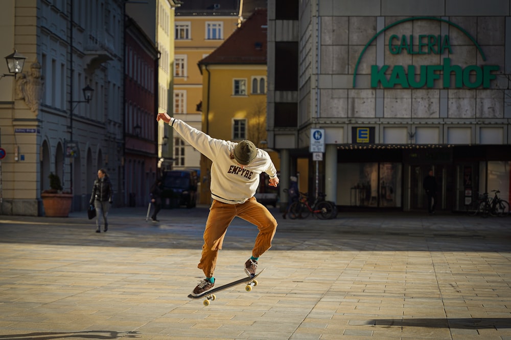 a man riding a skateboard through the air