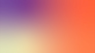 a blurry image of a rainbow colored background