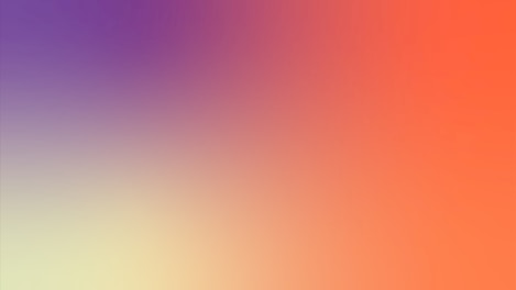 a blurry image of a rainbow colored background