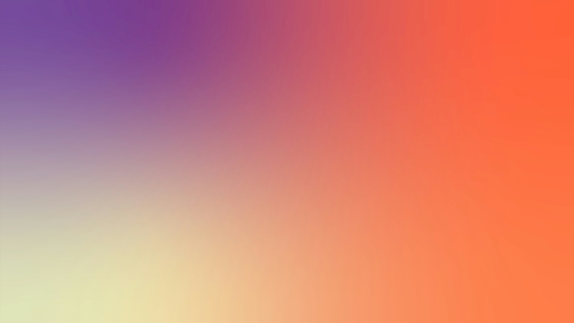 a blurry image of a rainbow colored background