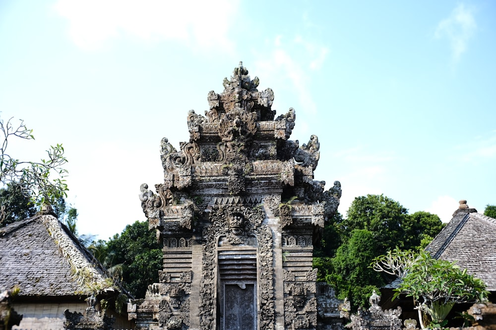 a large stone structure with a door in the middle of it