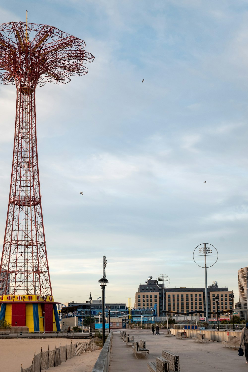 a large metal structure sitting on top of a sandy beach