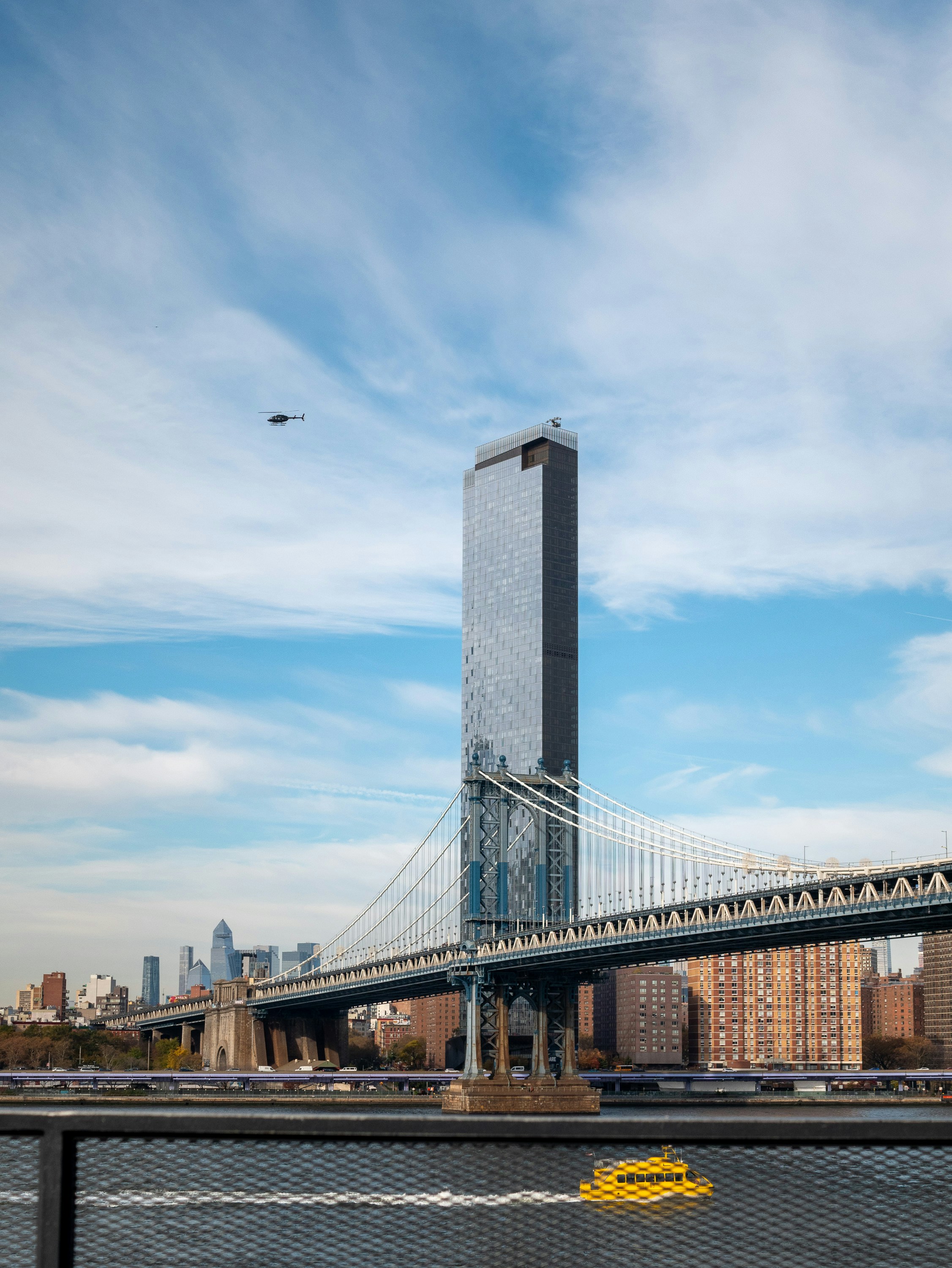 a large bridge spanning over a large body of water