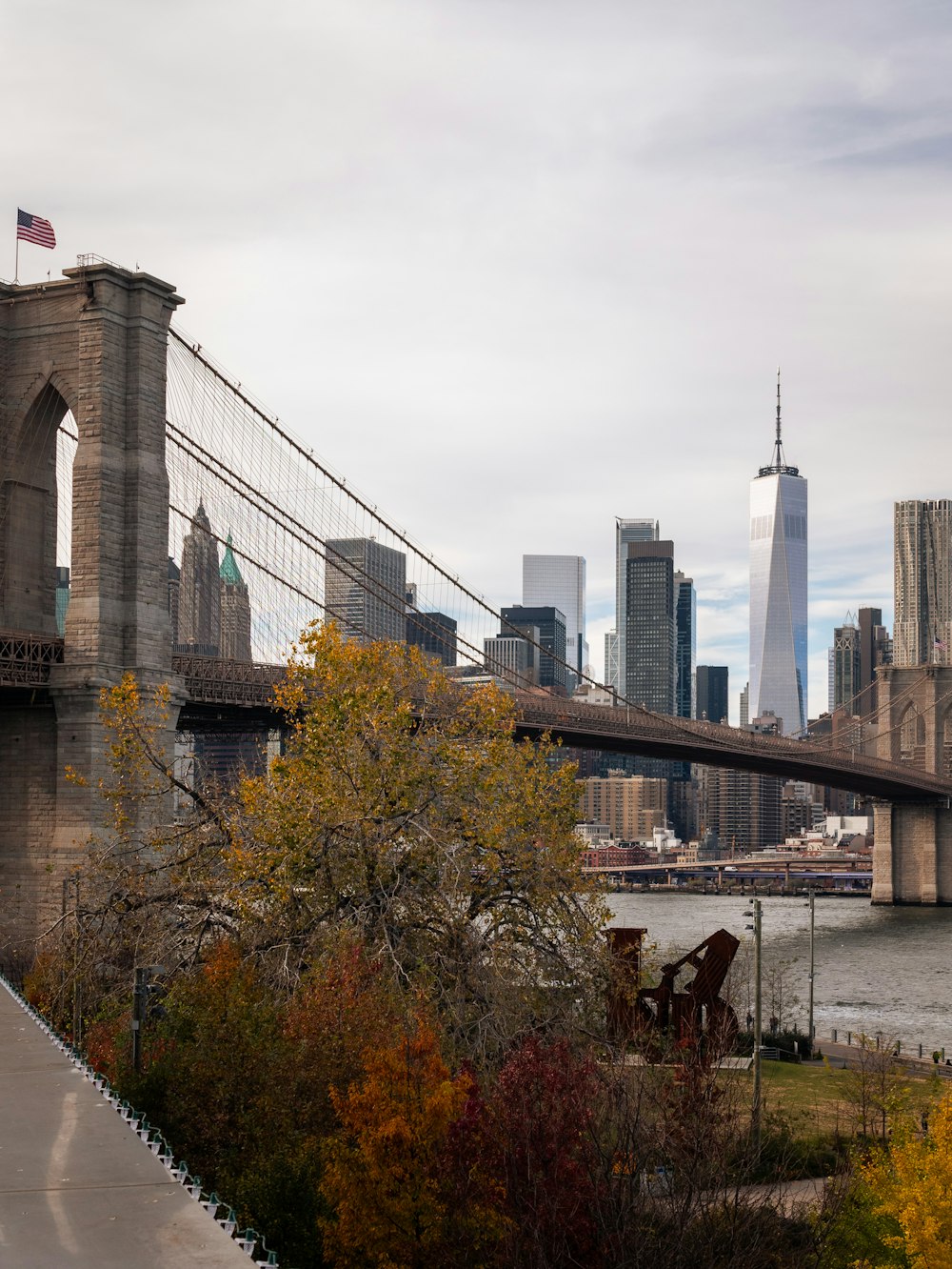 a view of the brooklyn bridge and lower manhattan