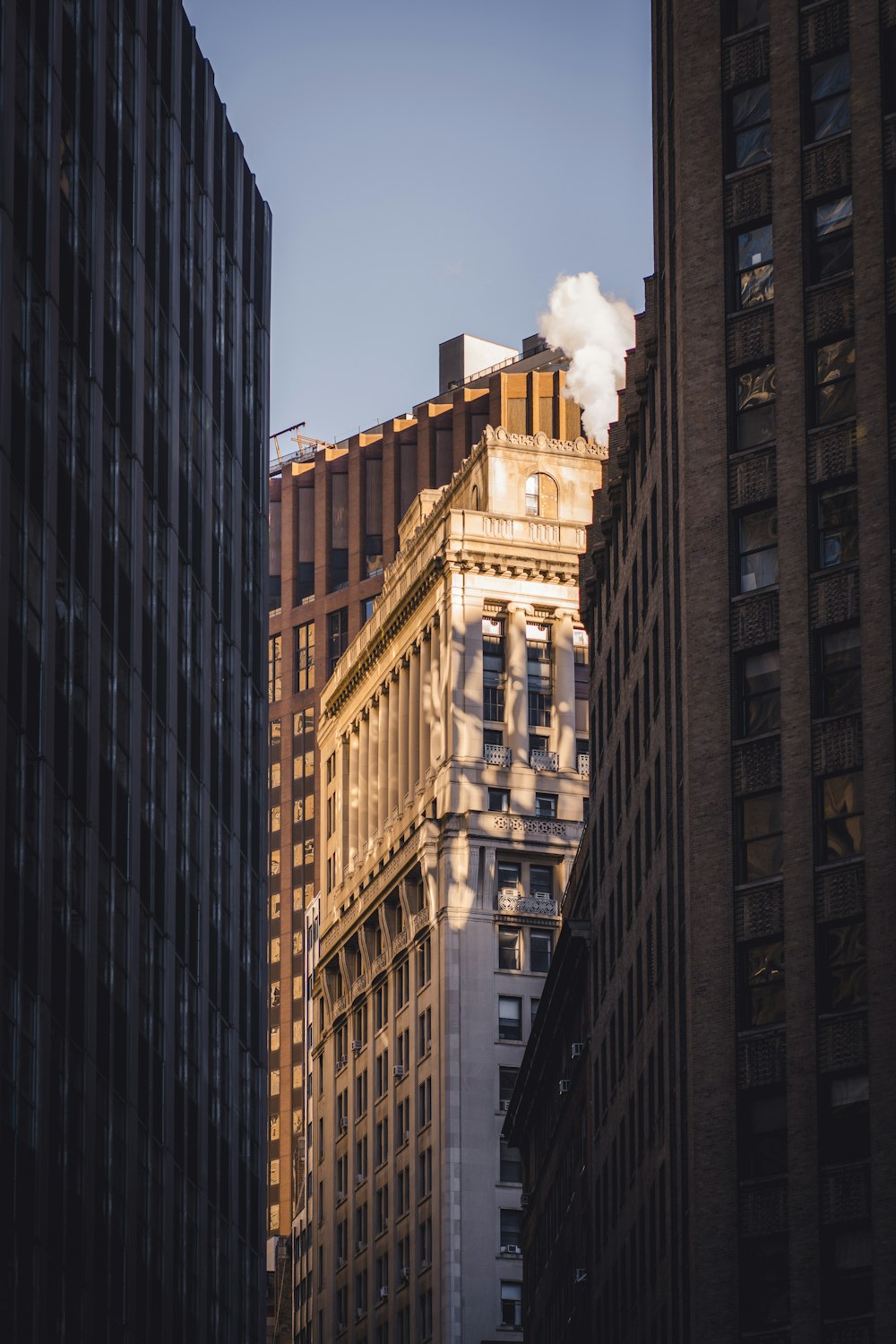 a view of the top of a building in a city