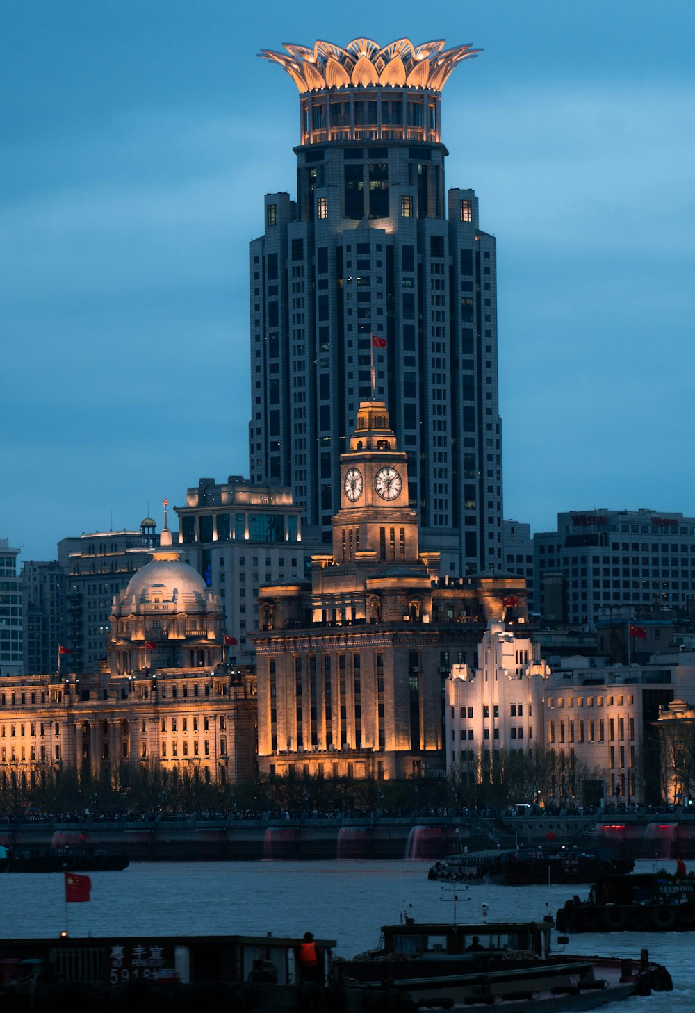 a very tall building with a clock on it's side