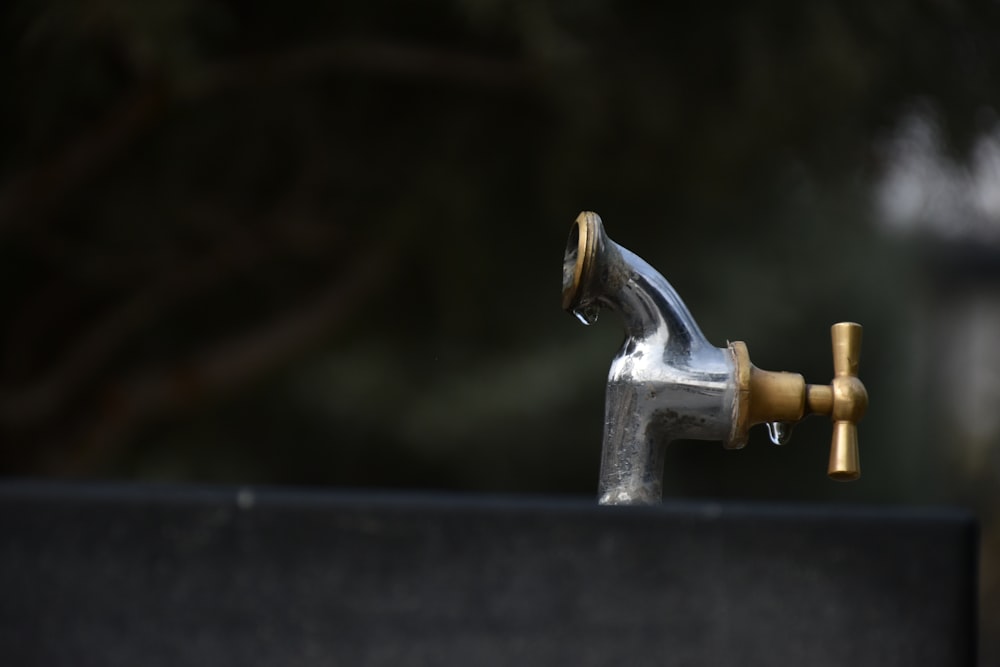 a faucet with a spigot attached to it