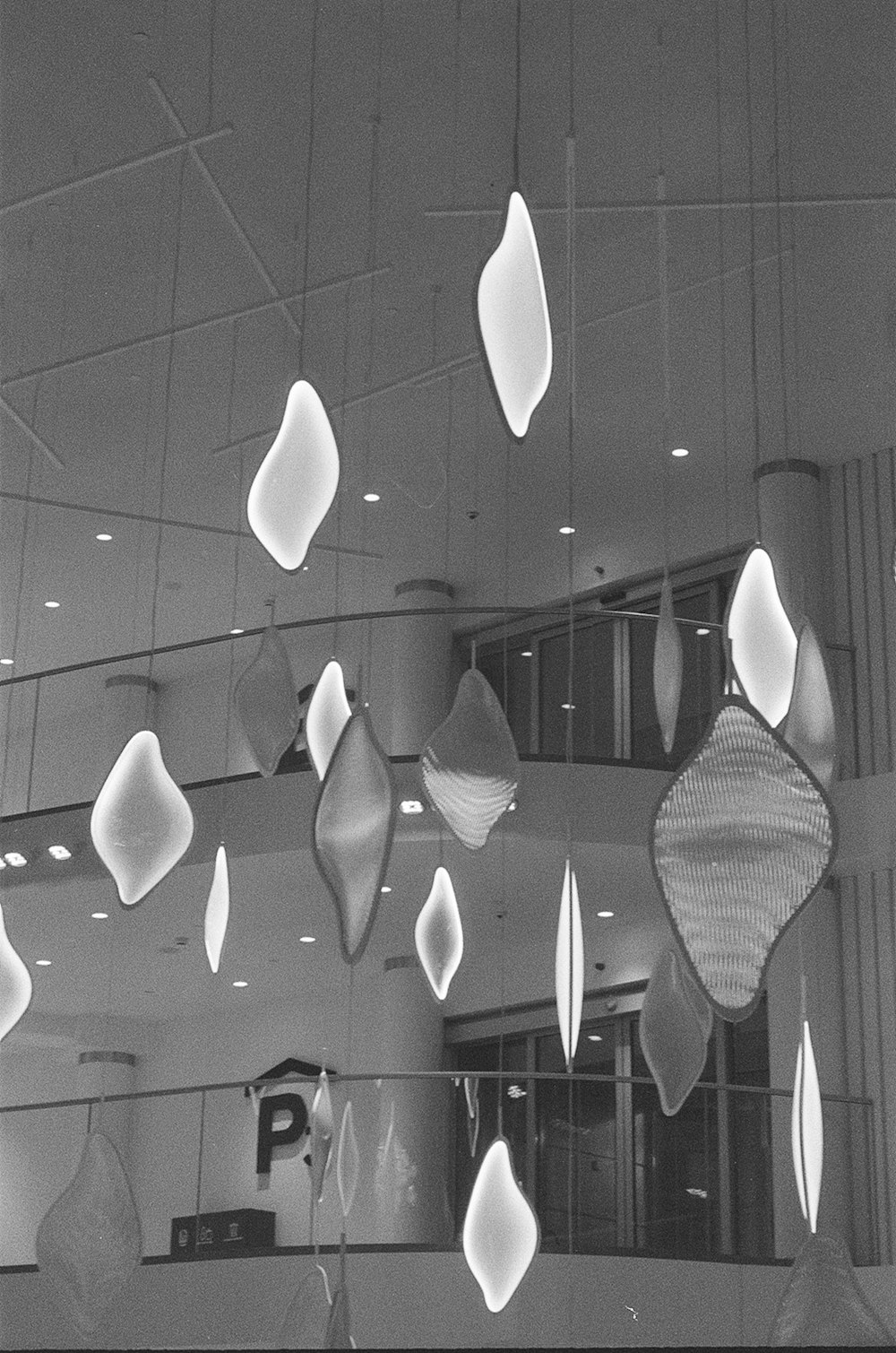 a black and white photo of a lobby