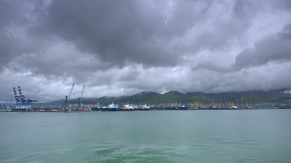 a large body of water under a cloudy sky