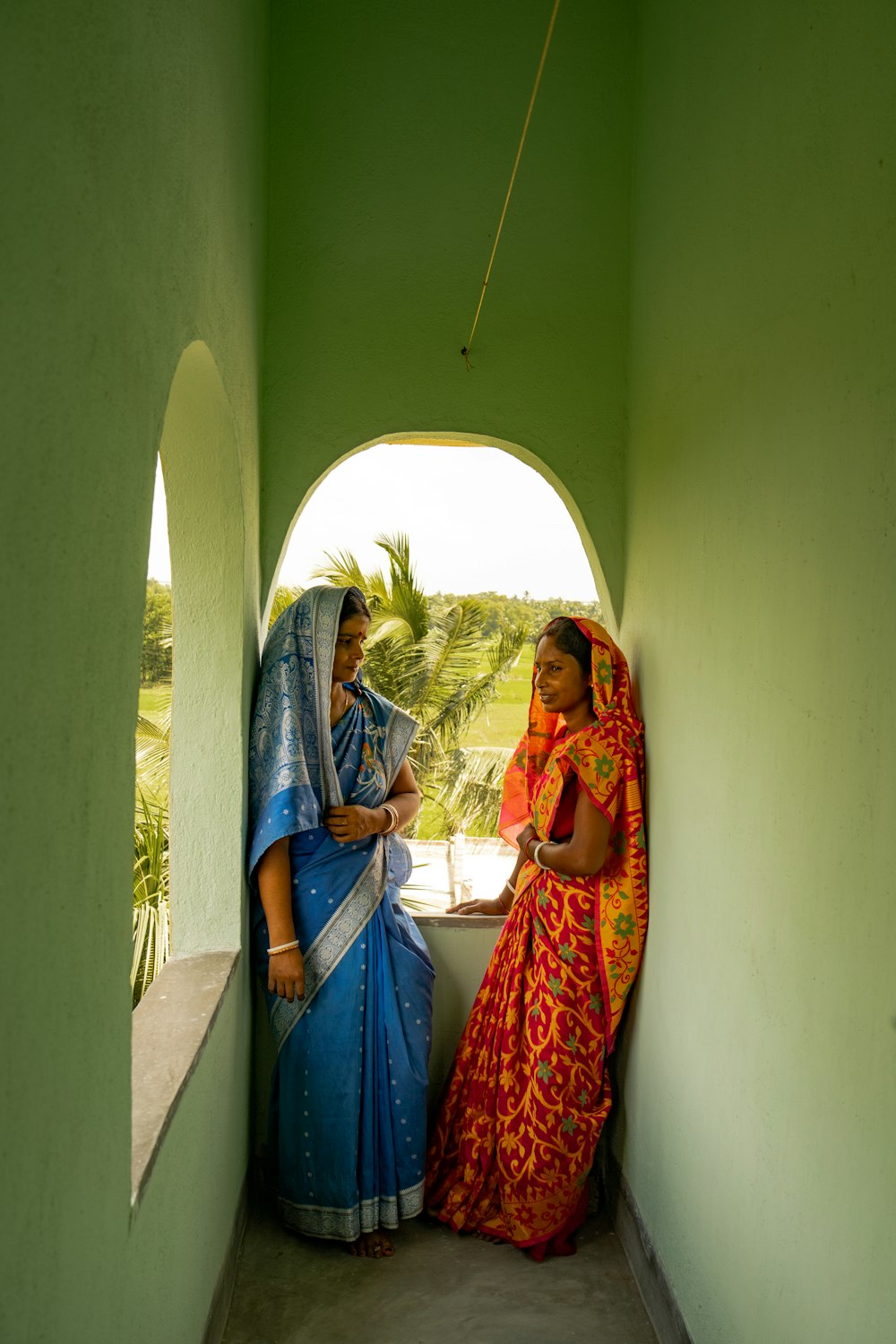 a couple of women standing next to each other