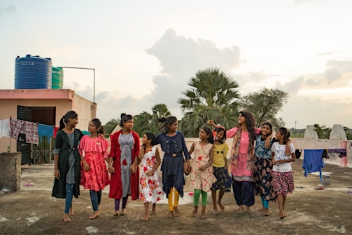a group of women standing next to each other