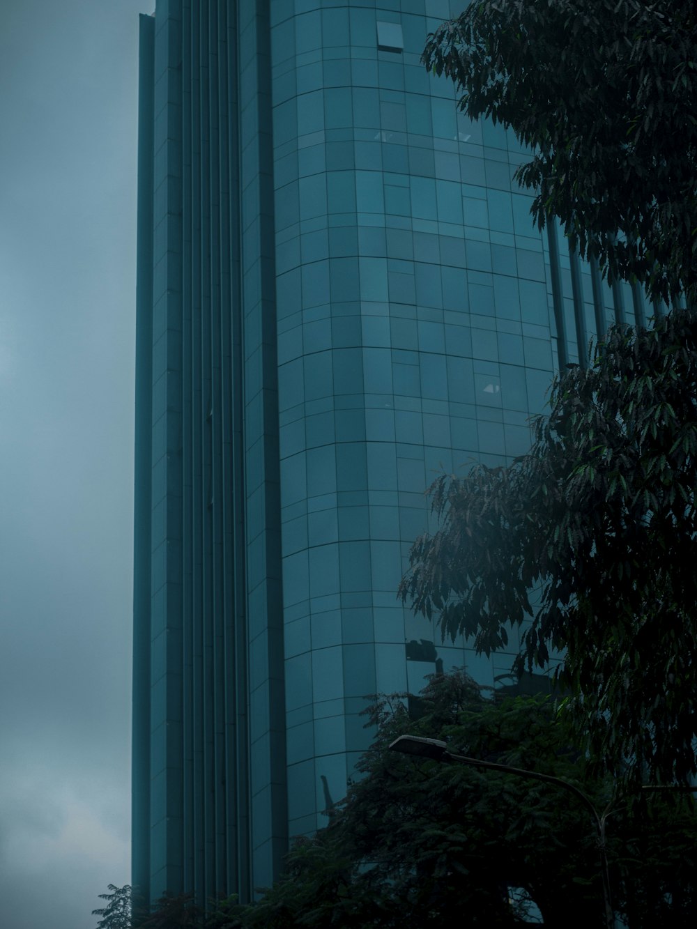 a tall building with a clock on the side of it