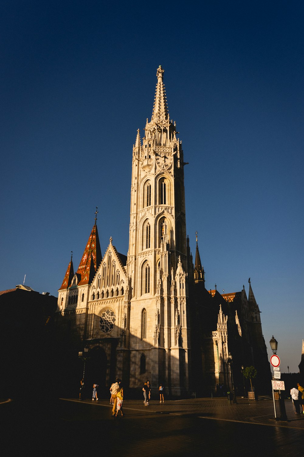 a very tall building with a clock on it's side