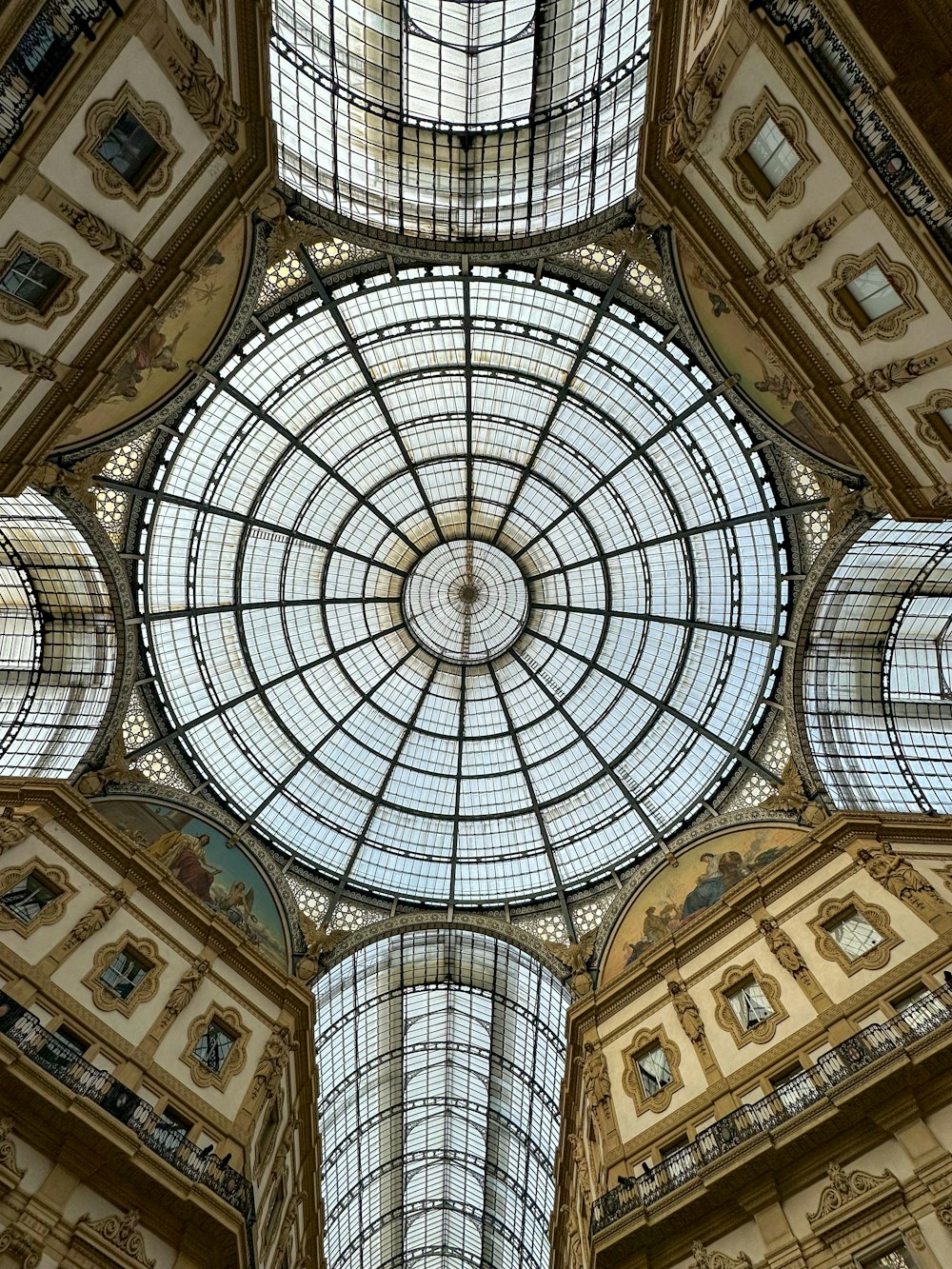 the ceiling of a building with a glass dome