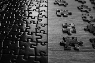 a close up of a puzzle on a table