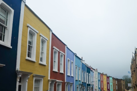 a row of colorful houses on a street