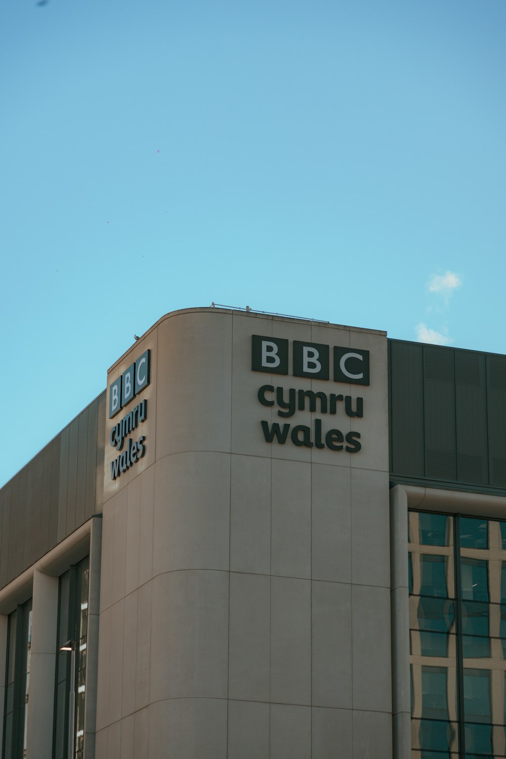 the outside of a building with a sky background