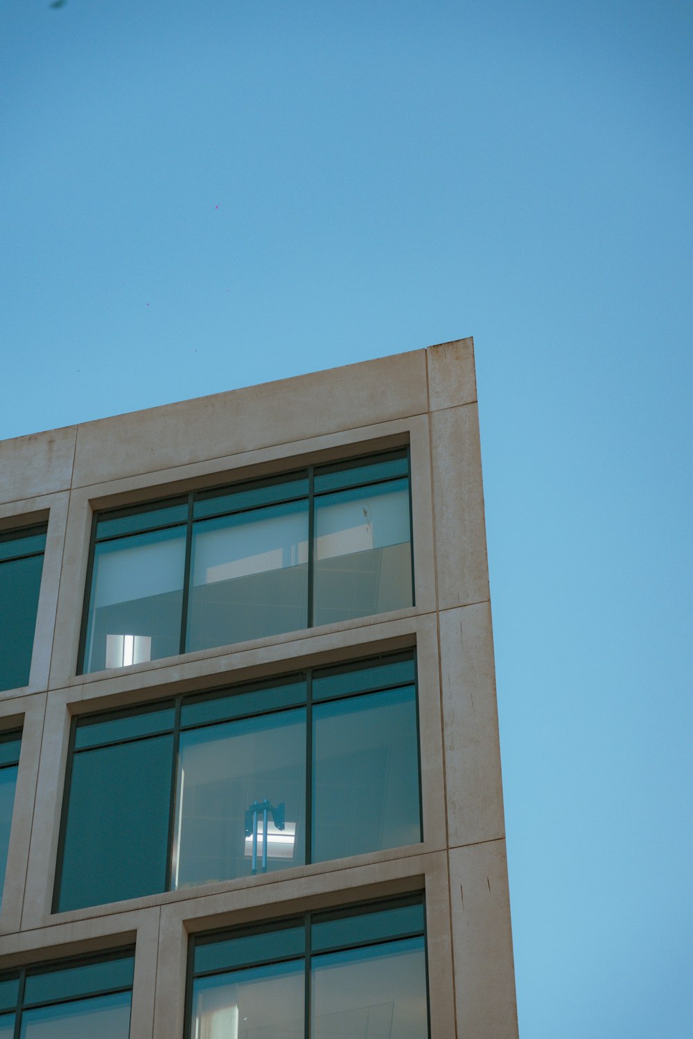 a tall building with lots of windows on top of it