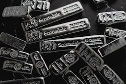 silver bars in a pile for silver ira investing