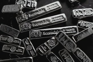 silver bars in a pile for silver ira investing