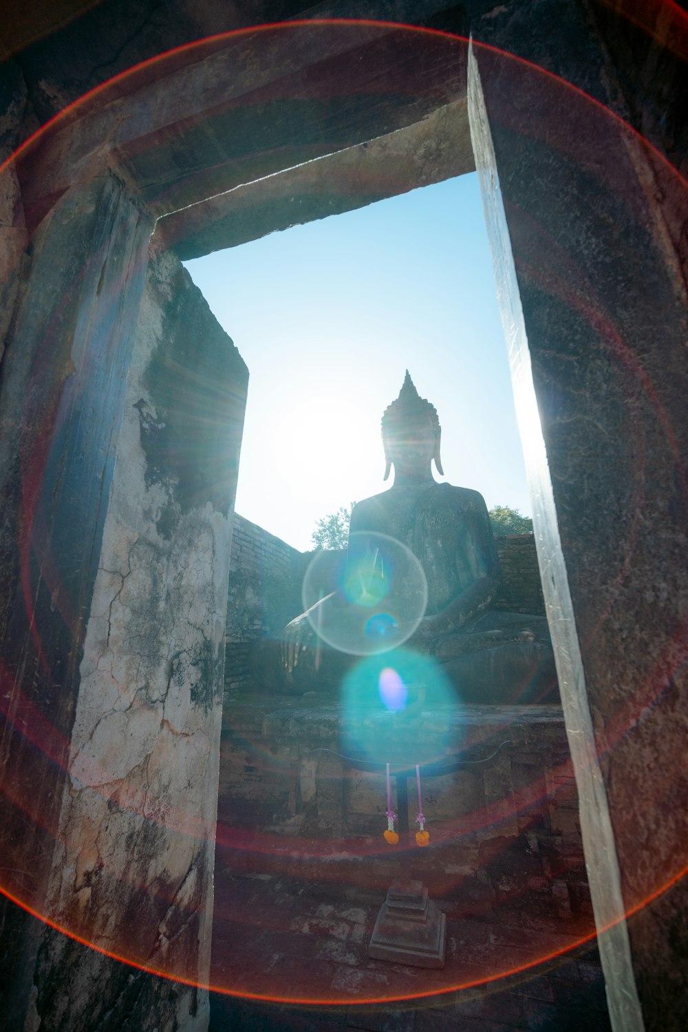 a person standing in front of a window in a building