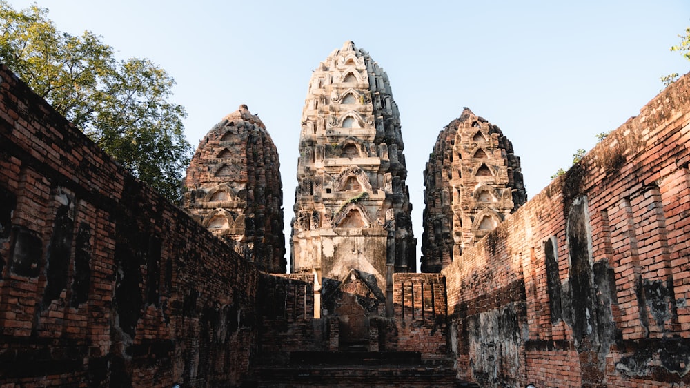 a very old building with some very tall towers