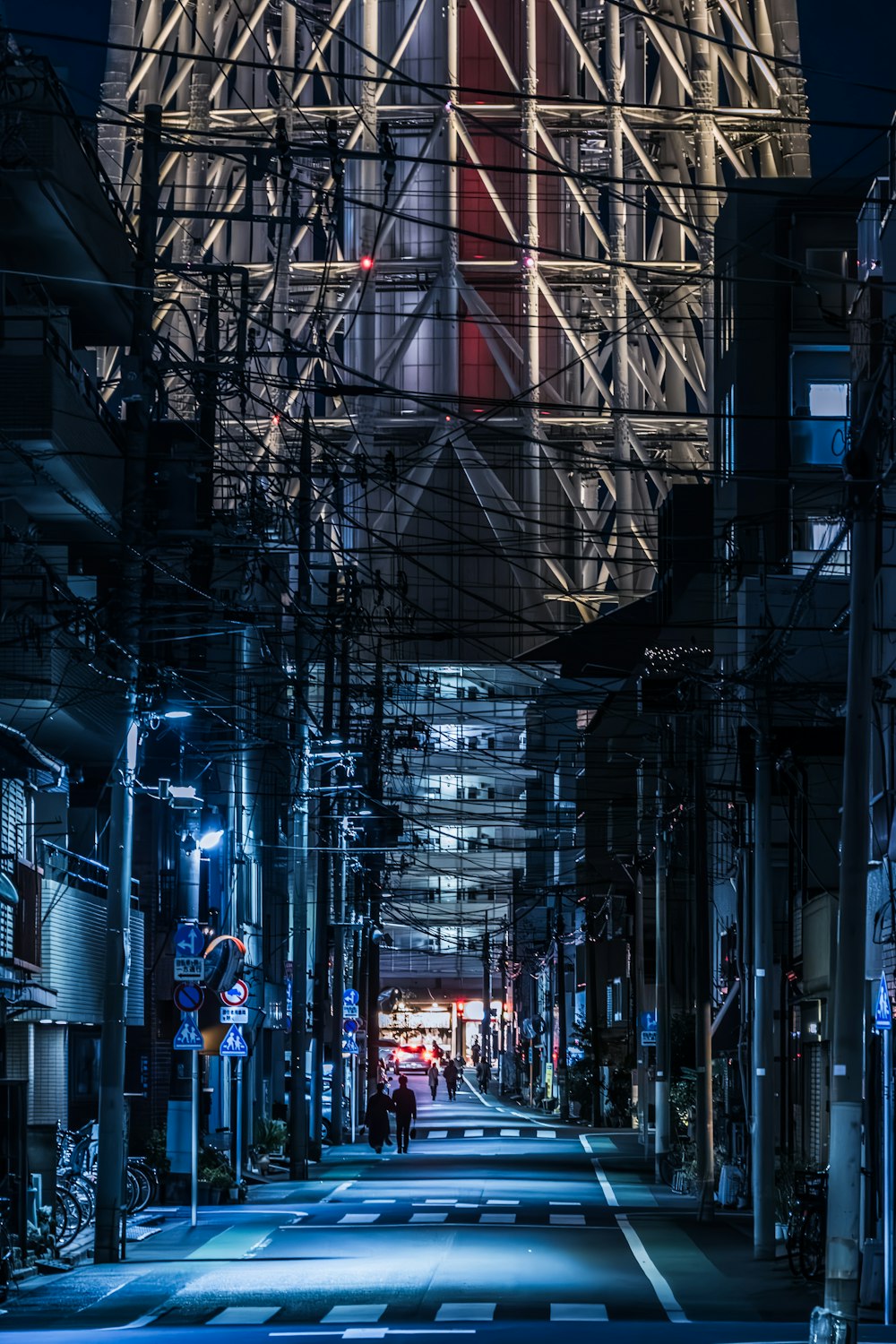 a city street with scaffolding on the side of it