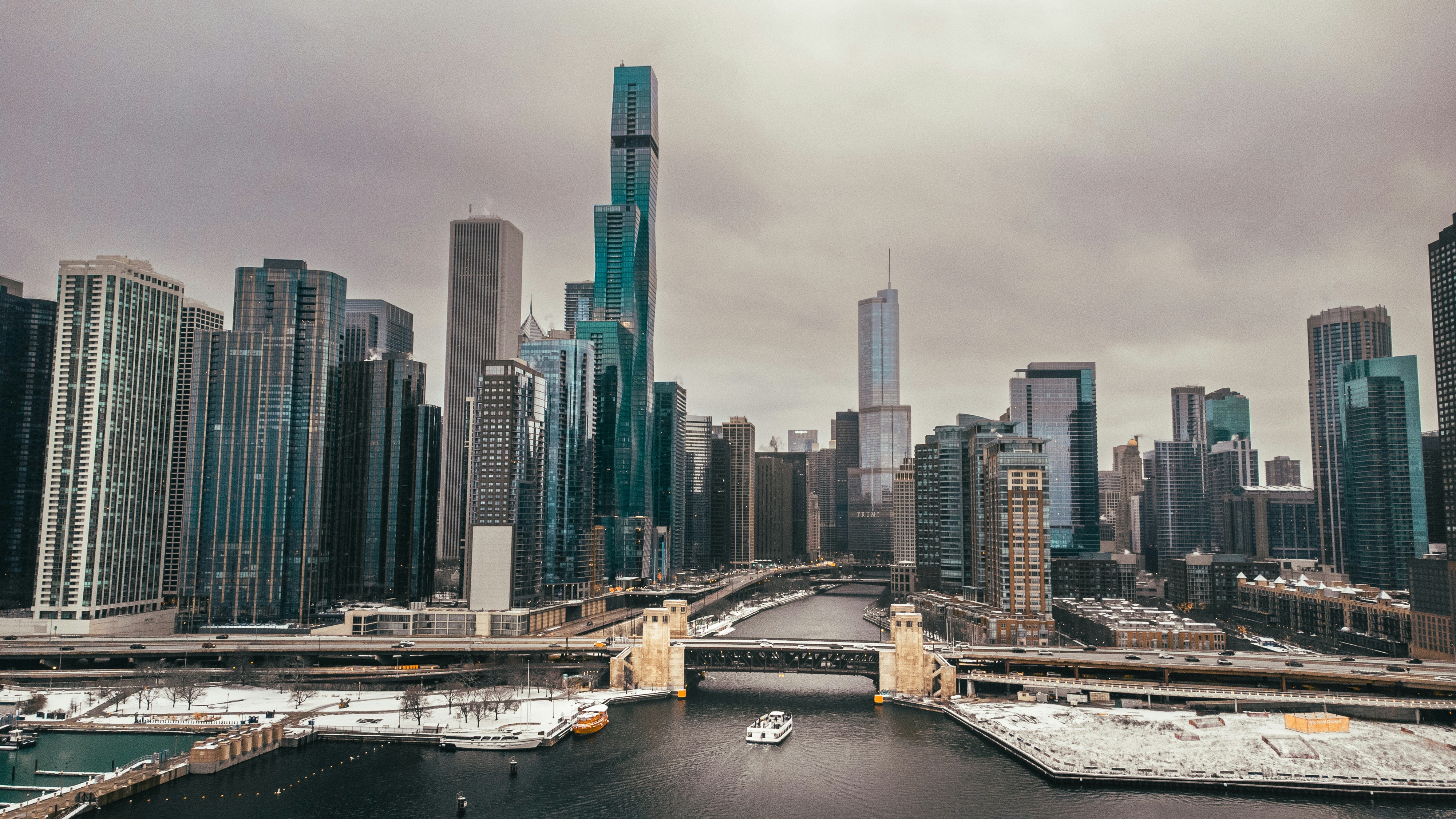 a view of a city from a bridge over a river