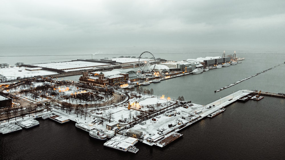 an aerial view of a harbor in winter