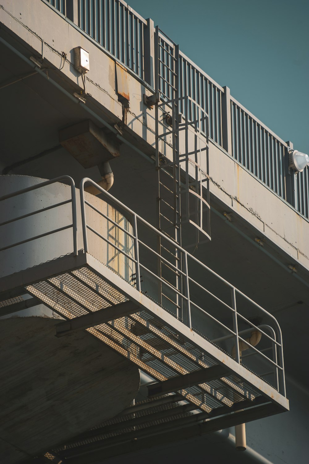 a building with a metal balcony and railing