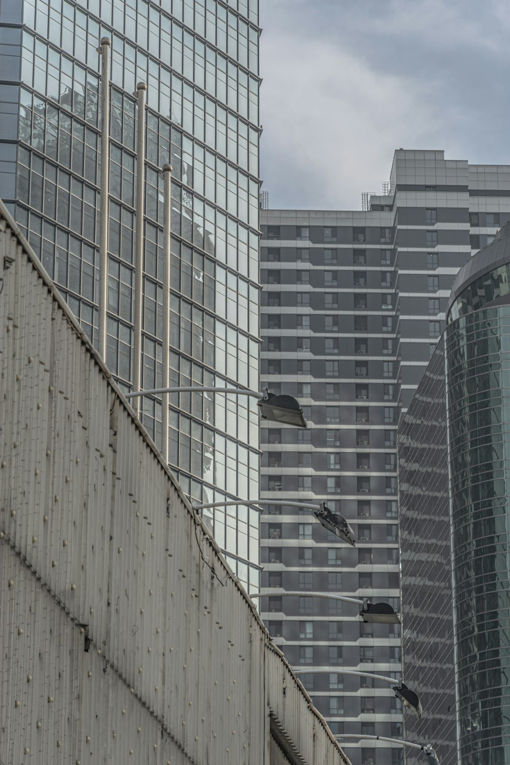 a bird is perched on the side of a building