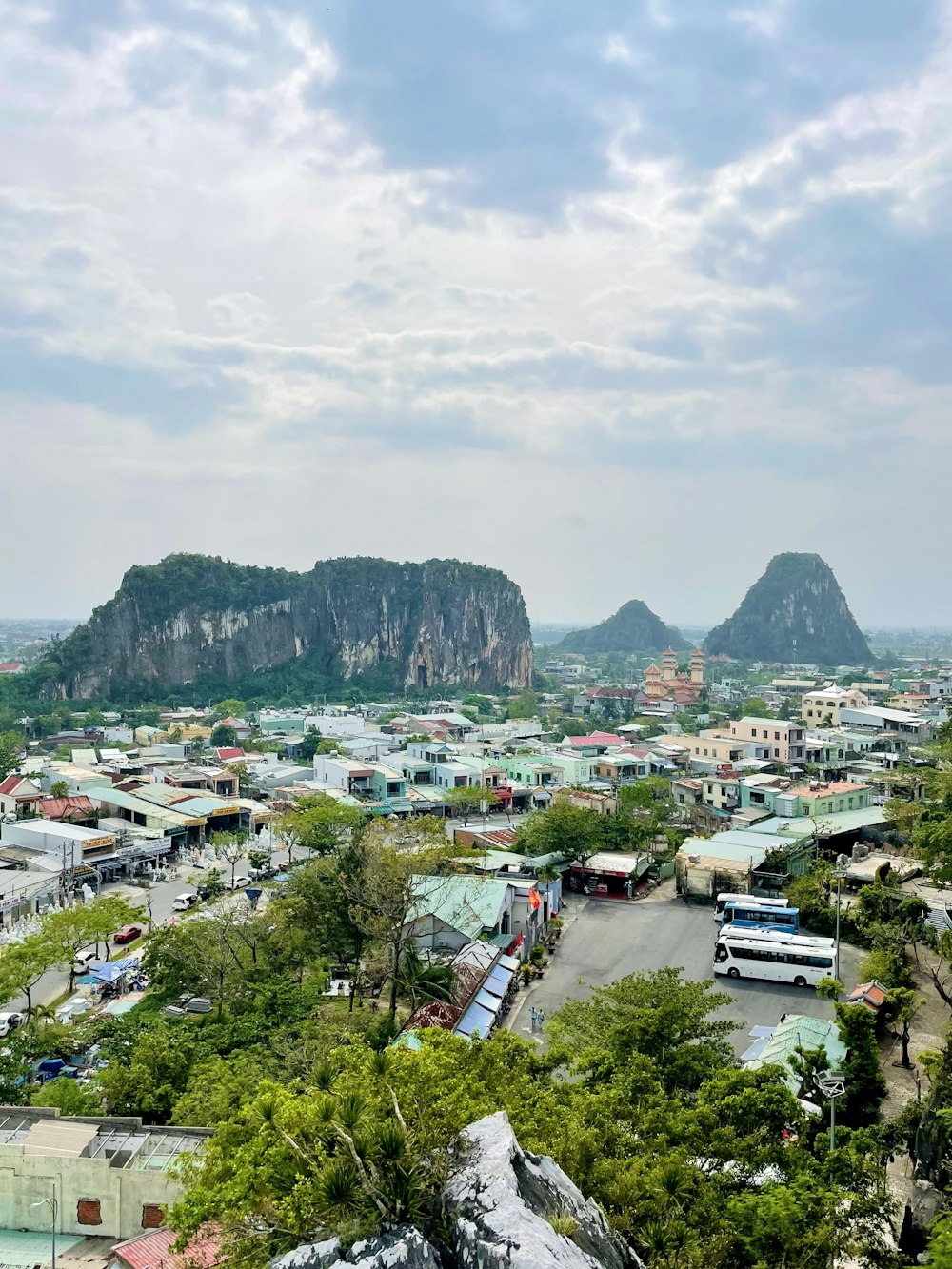 a view of a city with mountains in the background