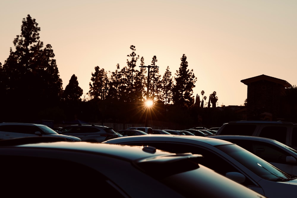 a parking lot filled with lots of parked cars