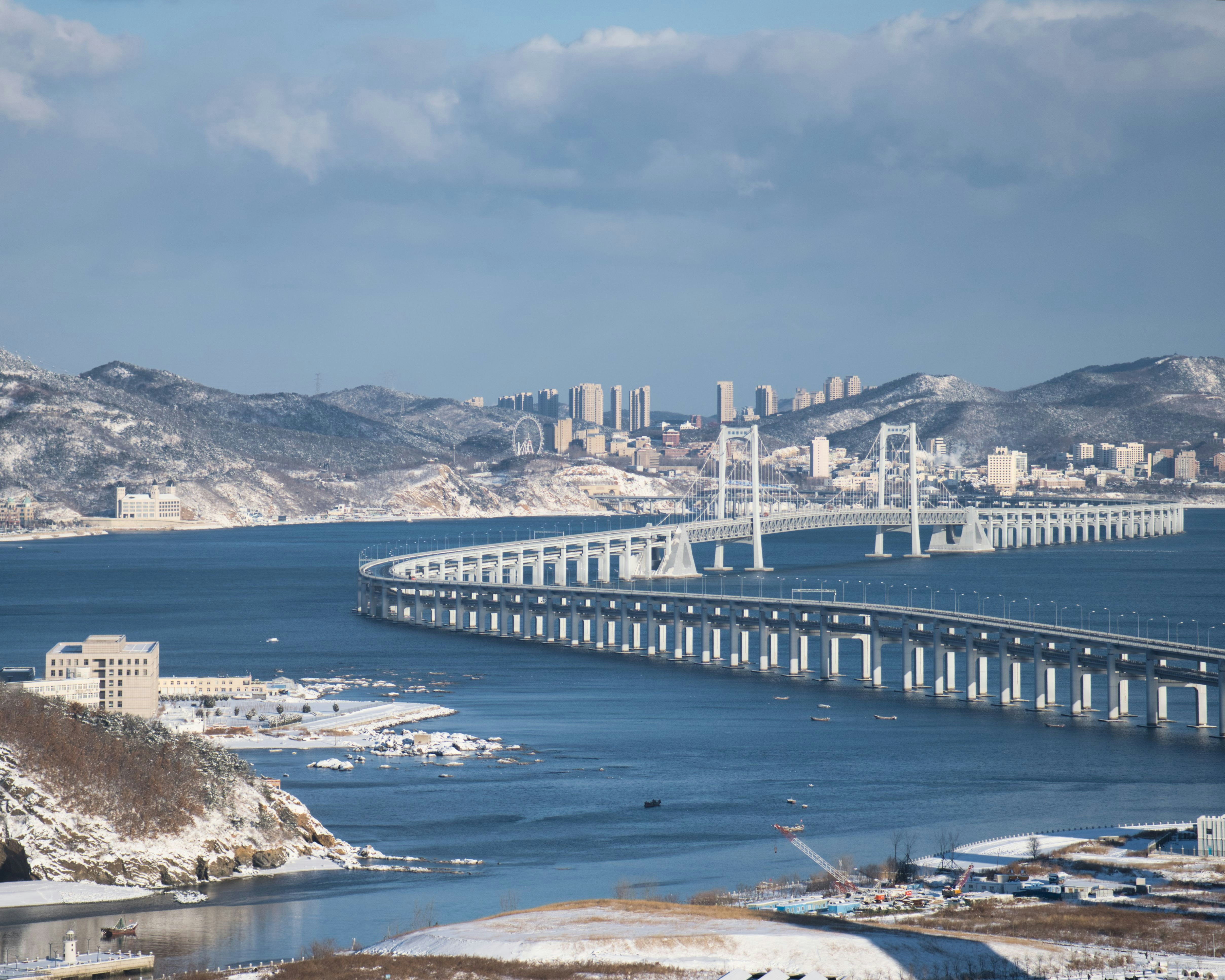 a large bridge spanning over a large body of water