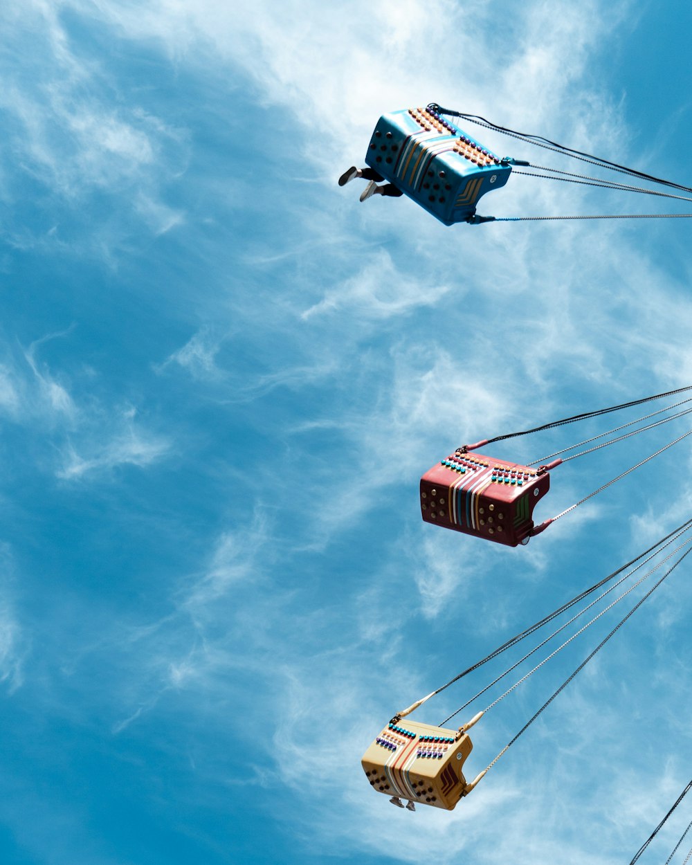 a group of people riding on top of a ferris wheel