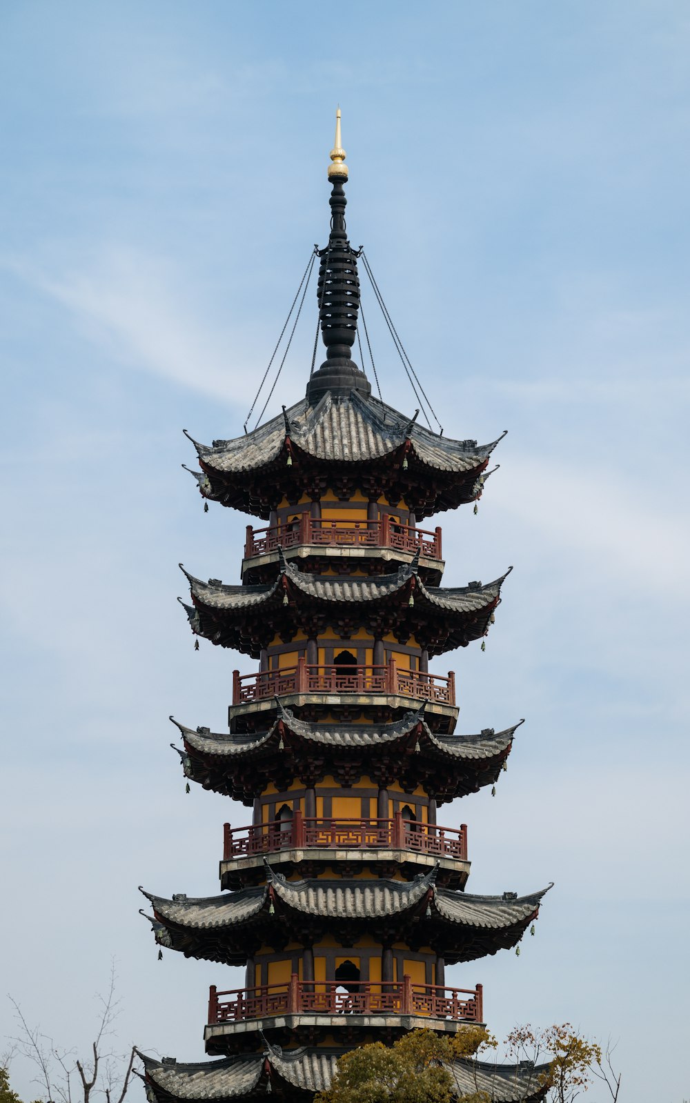 a tall tower with a clock on the top of it