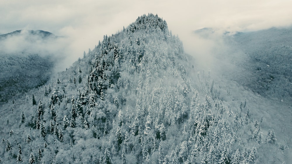 a very tall mountain covered in lots of snow