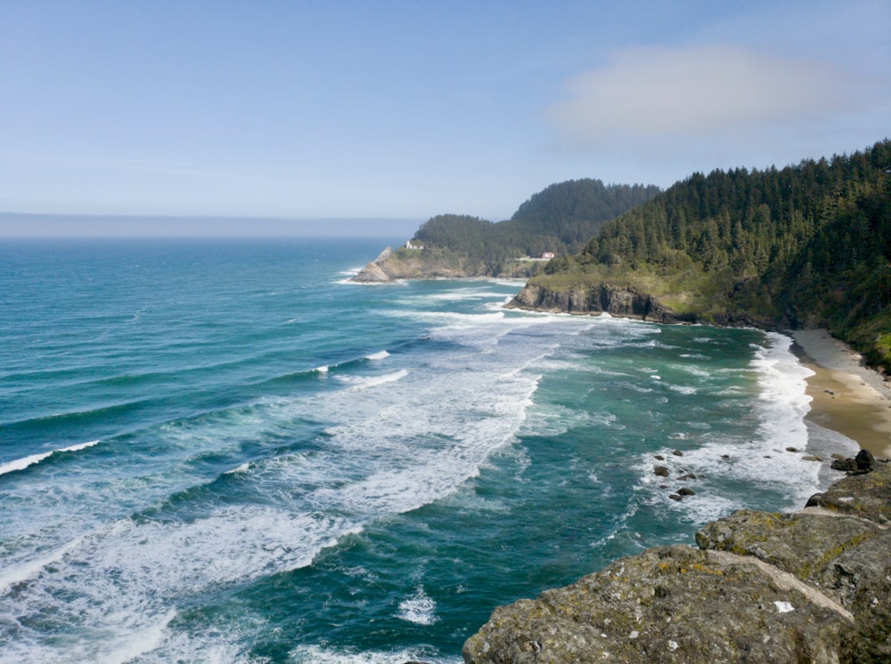 a view of the ocean from the top of a cliff