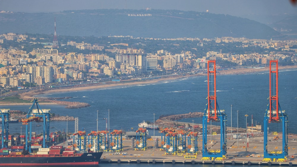 a large body of water with a city in the background