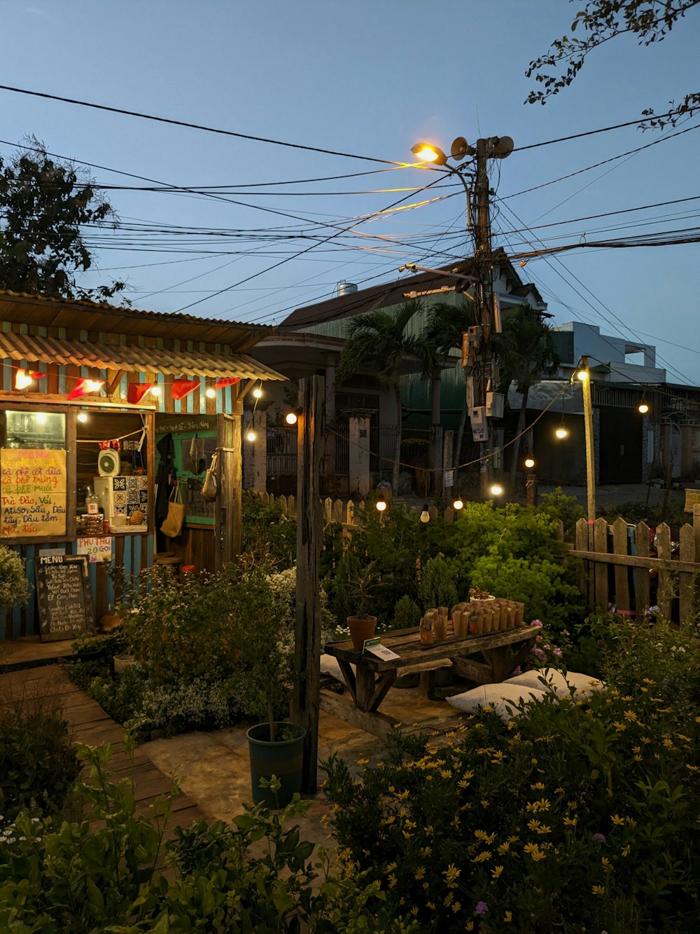 a small building with a bunch of lights on it