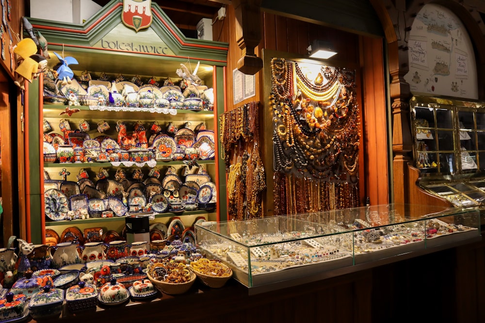 a display case filled with lots of different types of jewelry