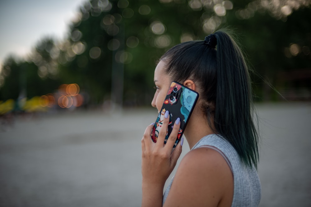 a young woman talking on a cell phone