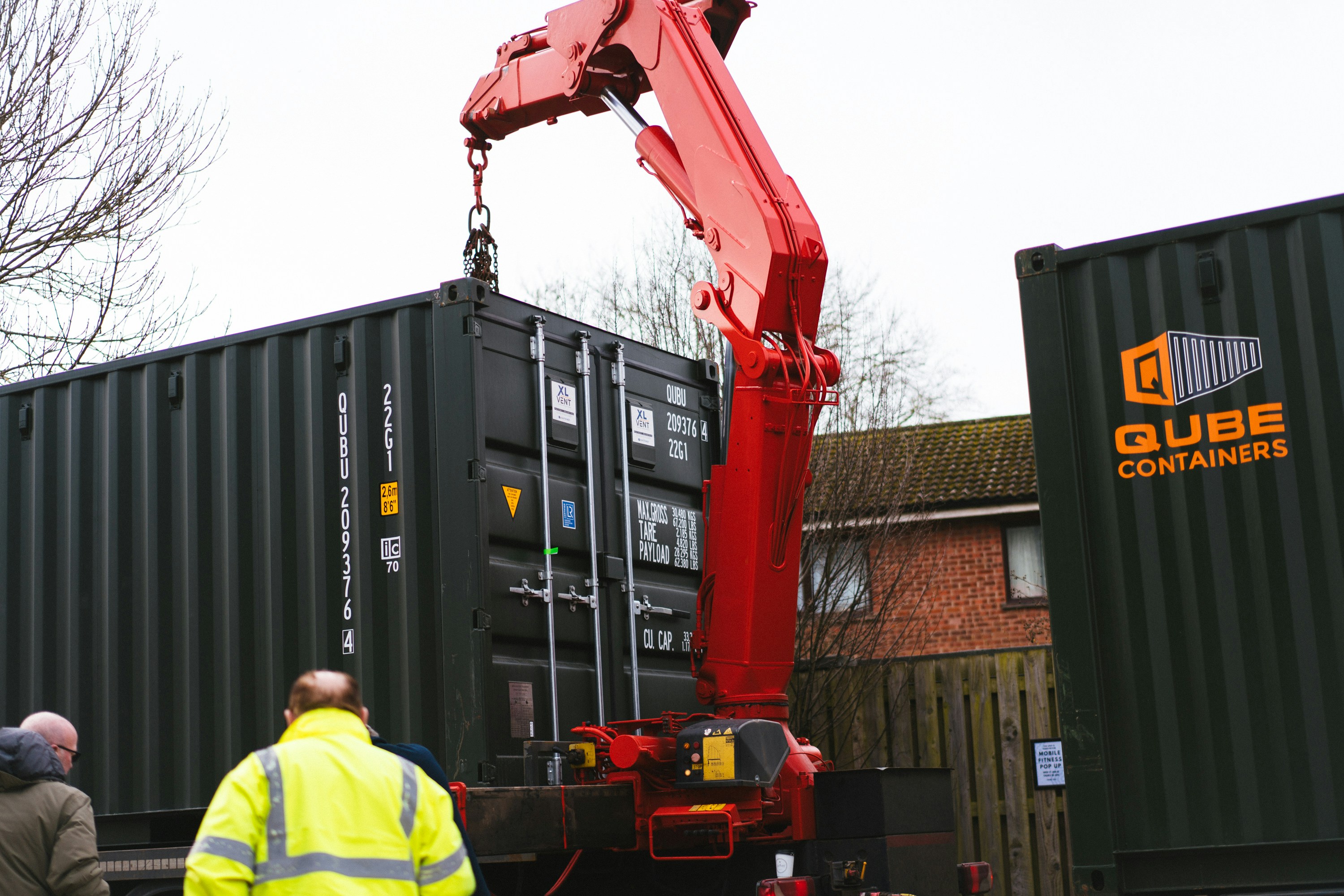 Portable storage container being used on a commercial construction site - rent a pod