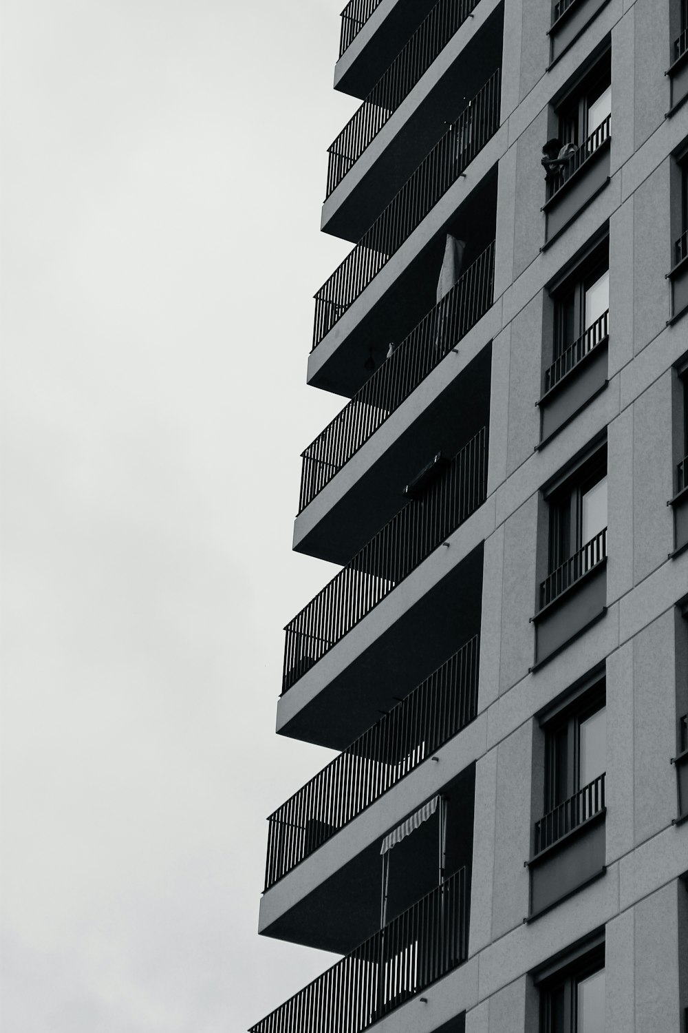 a tall building with balconies and balconies on the balconies