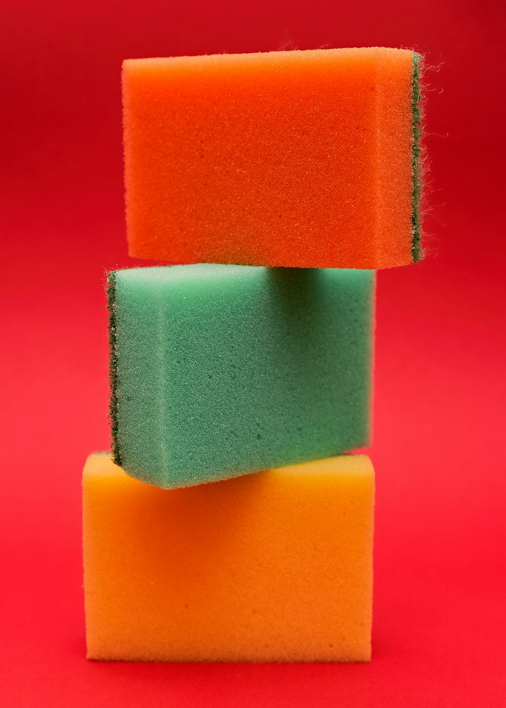 three sponges stacked on top of each other