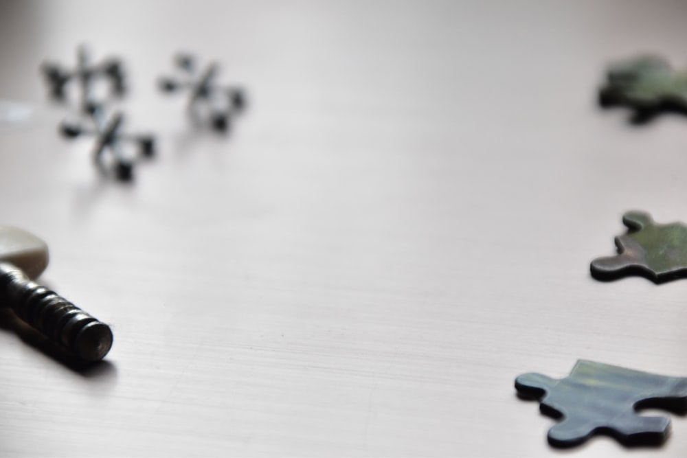 a close up of a piece of puzzle on a table