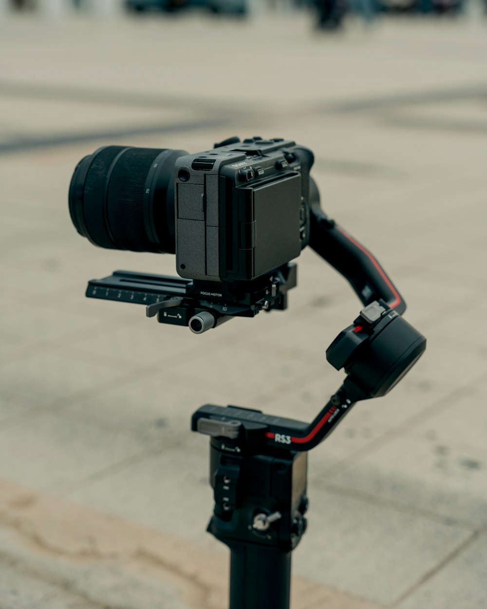 a camera attached to a pole on a city street