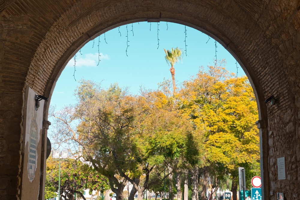 a view of a street through an archway