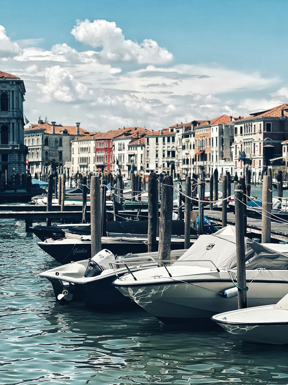 a bunch of boats that are sitting in the water